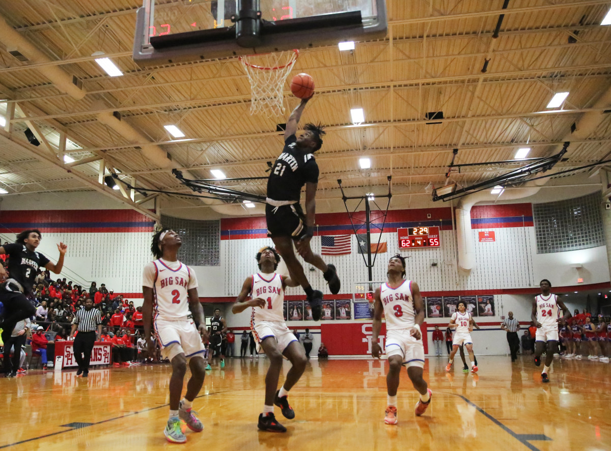 The Arlington Sam Houston Texans knocked off the Arlington Martin Warriors 70-59 in pivotal district victory on February 3, 2023.